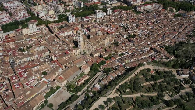 Jativa ,Valencia, Spain, Europe Aerial 4K video from drone to Spanish town of Xativa on background of Roman Catholic Basilica. (Series)