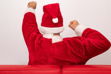 santa claus on the sofa with expression of joy