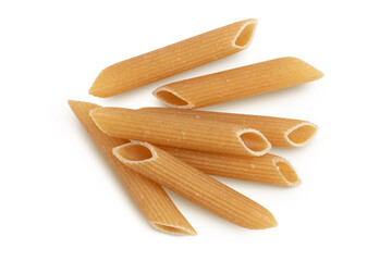 Wolegrain penne pasta from durum wheat isolated on white background with clipping path and full depth of field. Top view. Flat lay,
