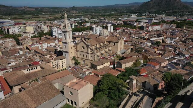 Jativa ,Valencia, Spain, Europe Aerial 4K video from drone to Spanish town of Xativa on background of Roman Catholic Basilica. (Series)