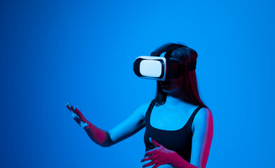 Smile happy woman getting experience using vr-headset glasses of virtual reality much gesticulating...