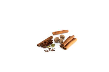 Cinnamon sticks, anise stars, nutmeg and cloves. Natural spices