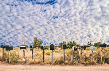 US mail. Old mailboxes by the side of the road