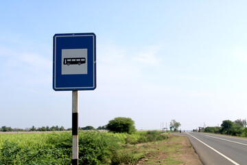 Bus Stop sign on National Highway 218.