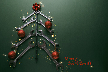 Christmas tree made of various tools on a green background. Happy christmas and happy new year....