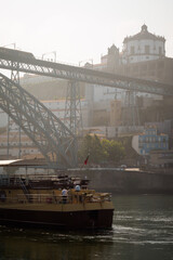 Sunrise over the Dom Lu&iacute;s I Bridge over the Douro River in Porto