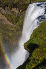 Picturesque full of water big waterfall Skogafoss autumn view, southwest Iceland.