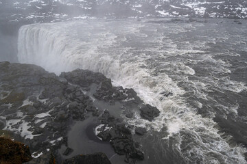 Picturesque full of water big waterfall Dettifoss autumn dull day view, north Iceland.