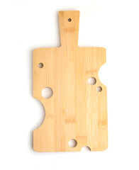 wooden board in the shape of cheese