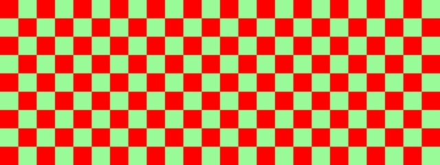Checkerboard banner. Pale Green and Red colors of checkerboard. Small squares, small cells. Chessboard, checkerboard texture. Squares pattern. Background.