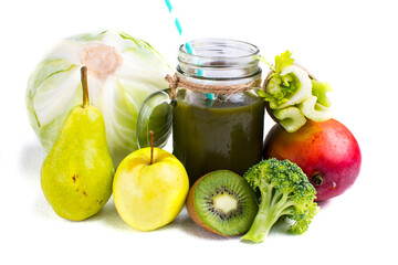 Detox diet concept: green vegetables on white background.