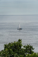 Boat sailing through the sea near Joatinga beach, Rio de Janeiro, Brazil. Selective focus