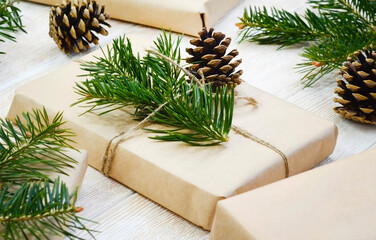 eco friendly merry christmas gift in craft paper wrapping, zero waste reusable concept, natural decor and sustainable lifestyle no people