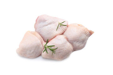 Raw chicken thighs with rosemary on white background, top view