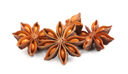 Dry anise stars with seeds on white background