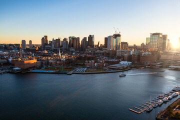 Fototapeta na wymiar Aerial Fall photo of downtown Boston from Boston Harbor during sunset