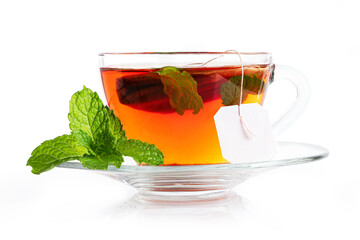 Cup of tea with mint on white background