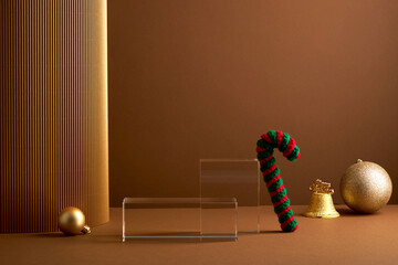 A front view of transparent podium in brown background with christmas ornament decorate and blank space for advertising , 