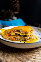 Slice of lasagna on a plate