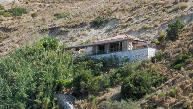 Old Villa On A Hill At Agia Kiriaki Beach Near Zola Village In Kefalonia, Greece. - Low-Angle Shot