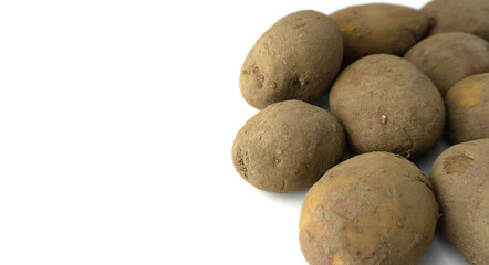 Fototapeta na wymiar raw unwashed potatoes from the side photo on a white background