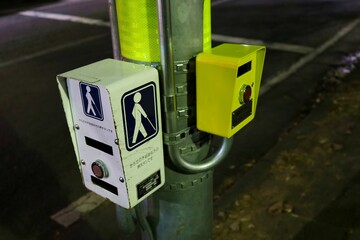 Sendai City, Miyagi Prefecture Japan, November 2021. Push-button traffic light at night.
Concept:...