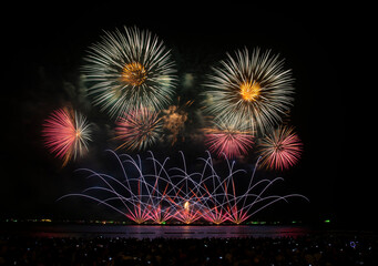 Colourful fireworks on the dark sky for celebration and festival party Christmas and New year