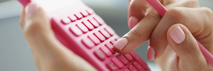 Financial inspector making report calculating or checking balance closeup