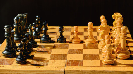 Playing old chess on a black background, retro board game