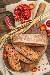 Whole grain bread with cranberry for holidays. Fresh homemade bakery, dry spikelets