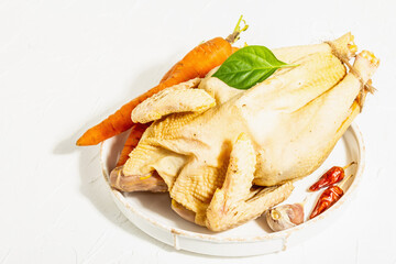 Whole free-range chicken poultry. Organic farm food, trendy hard light, dark shadow