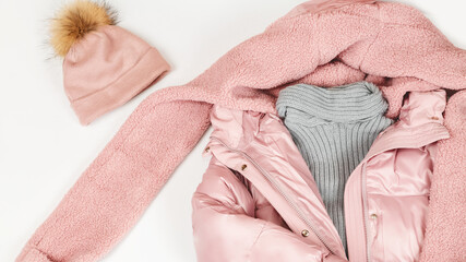 Women's warm winter clothing and accessories - jacket and hat. Fashion concept. Flat lay. Wish list or shopping overview concept