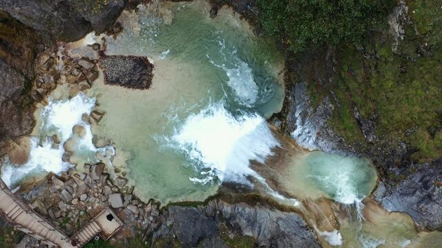 Aerial view of Waterfall tumbling down wooded cliffs into a rock pool. 4K.
Scenic nature of beautiful waterfall and emerald pool of fresh water lake in wild forest.4K.
Giresun Mavi Gol. Blue lake.