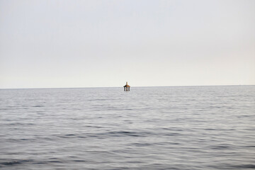 Fototapeta na wymiar boundary post on the sea