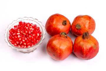Fresh ripe pomegranate isolated on white background. High resolution image