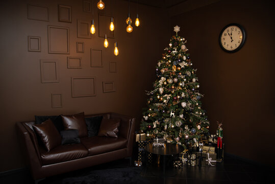 Christmas interior in brown tones with a tree, din and lights 