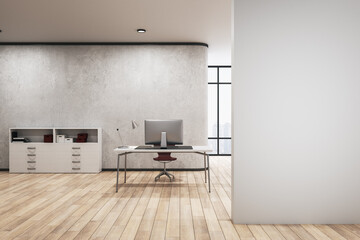 Modern concrete office interior with empty mock up place on wall, desktop and computer, other pieces of furniture and objects, window with city view and wooden flooring. 3D Rendering.