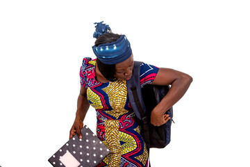 beautiful young student girl is looking for something in her backpack.