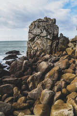 .Beautiful and wild rocky coast of France in vintage retro tones, vintage landscape of coastline of France