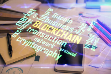 Fototapeta premium Double exposure of blockchain theme drawing and cell phone background. Concept of cryptomarket