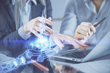 Double exposure of man and woman working together and creative hologram drawing. Start up concept. Computer background.