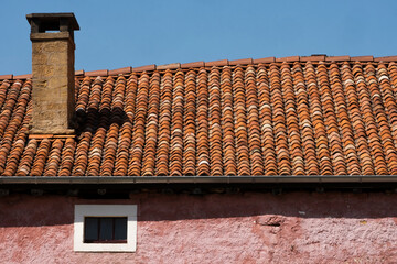 old brick chimney and rooftop in Torgny-Belgium