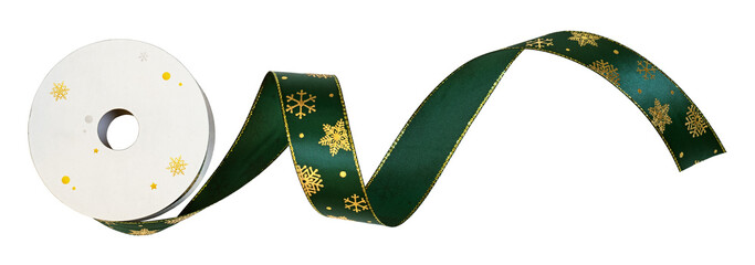 Paper spoolof green Christmas ribbon with golden snowflakes for festive decorations isolated