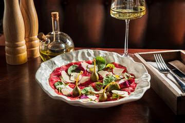 meat carpaccio with parmesan cheese