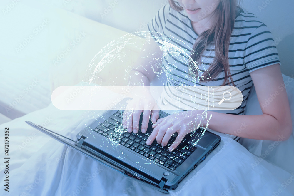 Poster Adult woman using laptop in the bedroom for searching browsing internet data information. Business concept for Using search with your website.