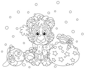 Fototapeta premium Cute little tiger in a Santa hat sitting on snow with a beautiful gift bag and a Christmas toy ball, black and white outline vector cartoon illustration for a coloring book page