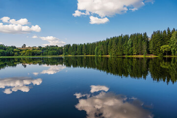 Obraz na płótnie Canvas View of the artificial mountain lake Trei Ape. Photo taken on 5th of July 2021 at the Trei Ape lake, Caras-Severin county, Romania.