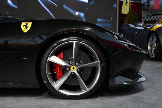 Scarperia, Mugello - 19 November 2021: Detail of alloy wheel of Ferrari car on display during Finali Mondiali Ferrari 2021 at Mugello Circuit in Italy.