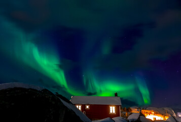 Aurora Borealis Over Norwegian Houses