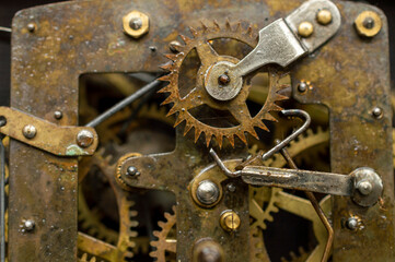 Machine is an apparatus using mechanic power and having several parts, each with a definite function and together performing a particular task. Here is the image of a machine with some parts in focus.